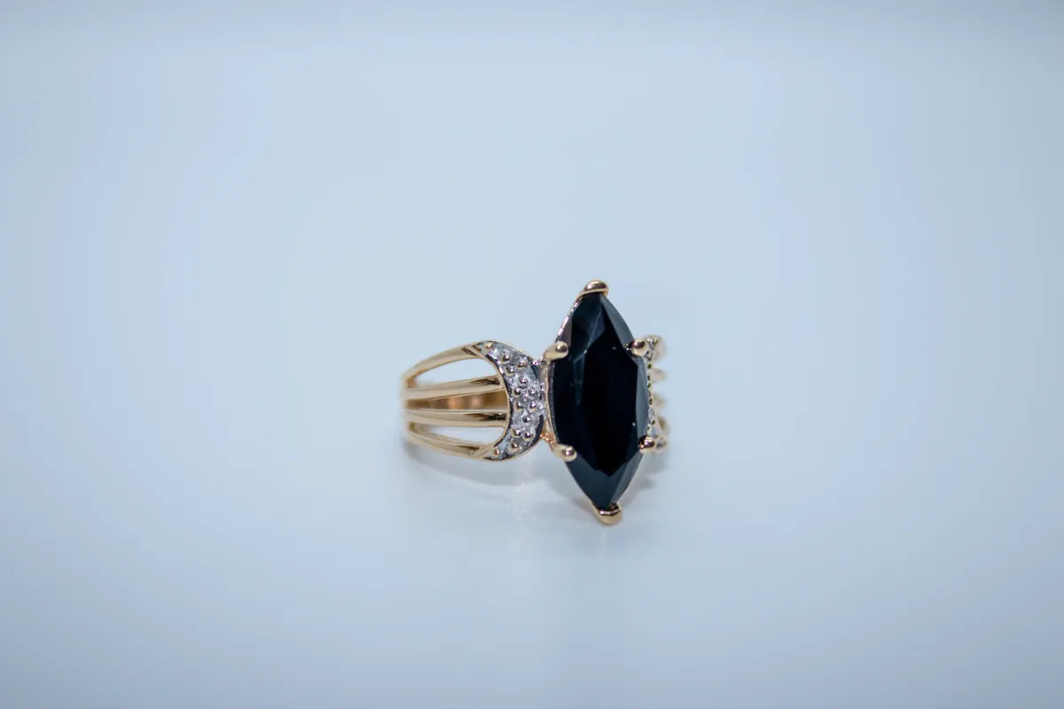 14 K Y/G Onyx and Diamond Marques Ring