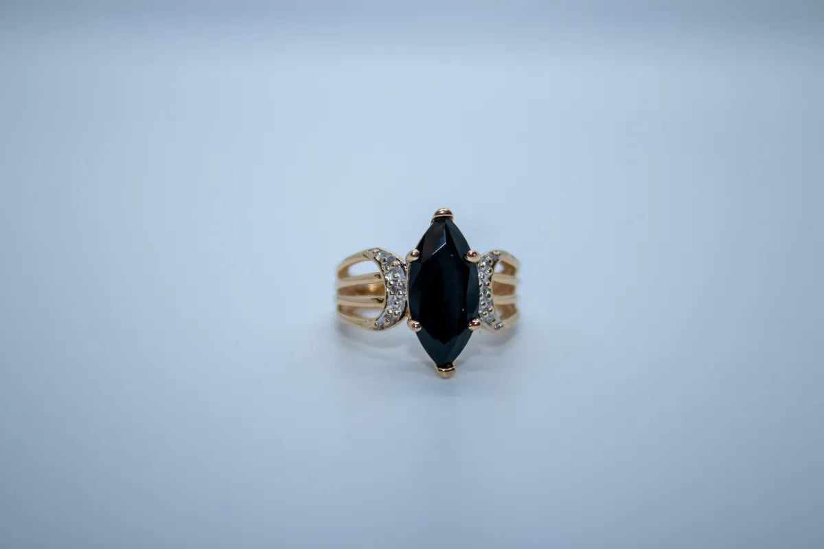 14 K Y/G Onyx and Diamond Marques Ring