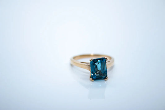 14 K Yellow Gold Blue Topaz Emerald Cut Ring