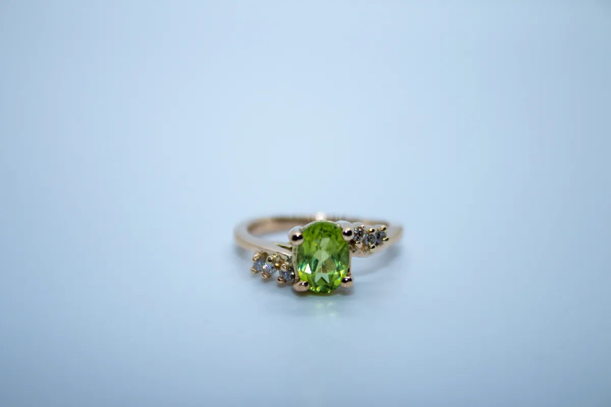 14 K Y/G Peridot and Diamond Ring