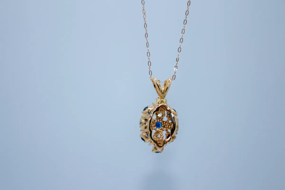 14 K Y/G Sapphire Diamond Cluster Pendant with chain